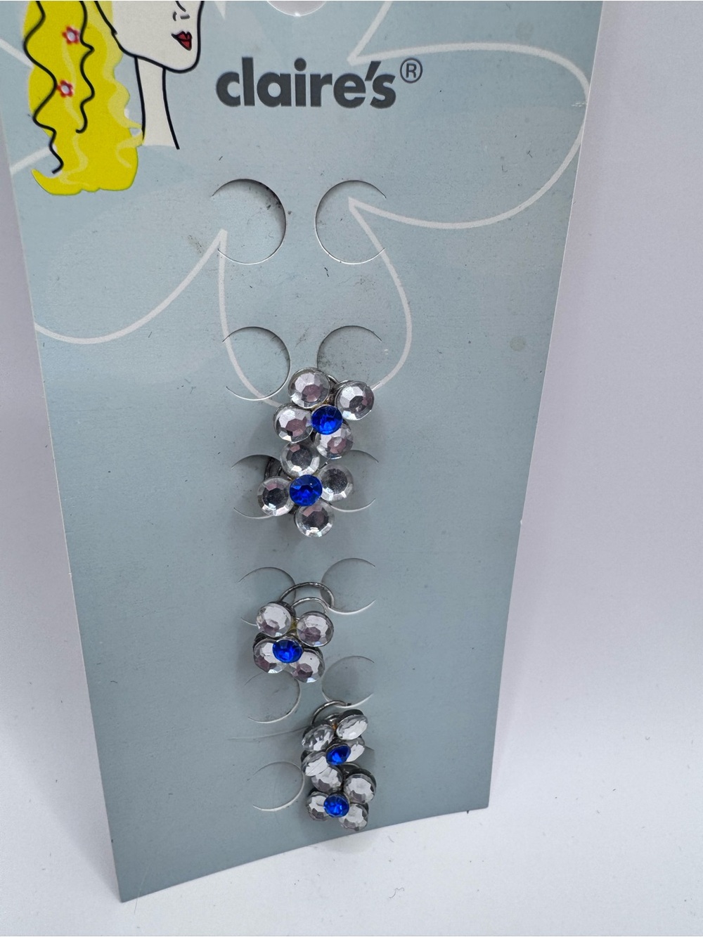 Y2K Claire's Silver Flower Hair Spins with Blue Centers